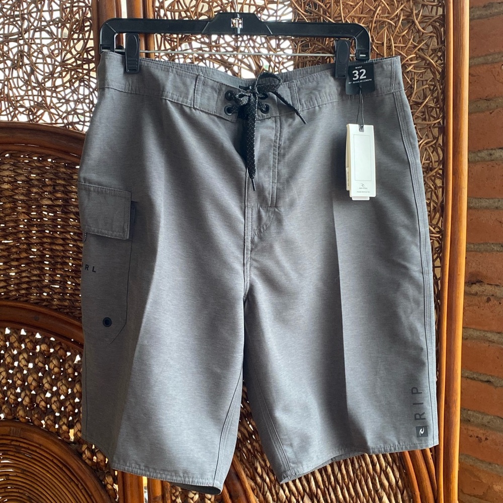 NWT Rip Curl NWT Charcoal Gray Board Shorts Size 32”. Excellent Condition!